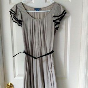 Tan and black ruffled cocktail dress